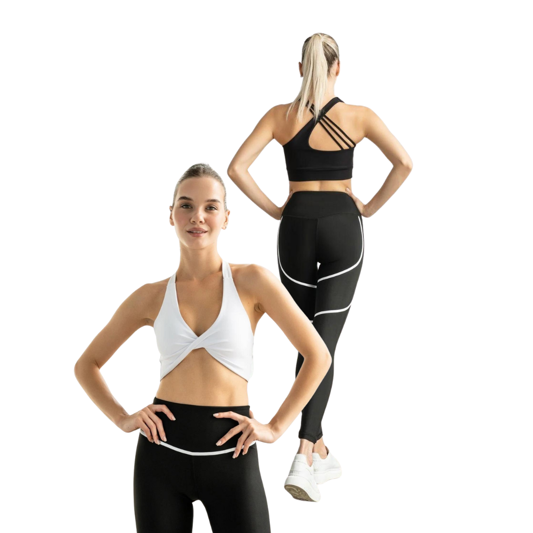 Zwei Frauen modellieren schwarze und weiße Sportkleidung, eine mit dem Gesicht nach vorne und eine mit dem Gesicht nach hinten.